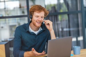 Answering service professional man with headset.